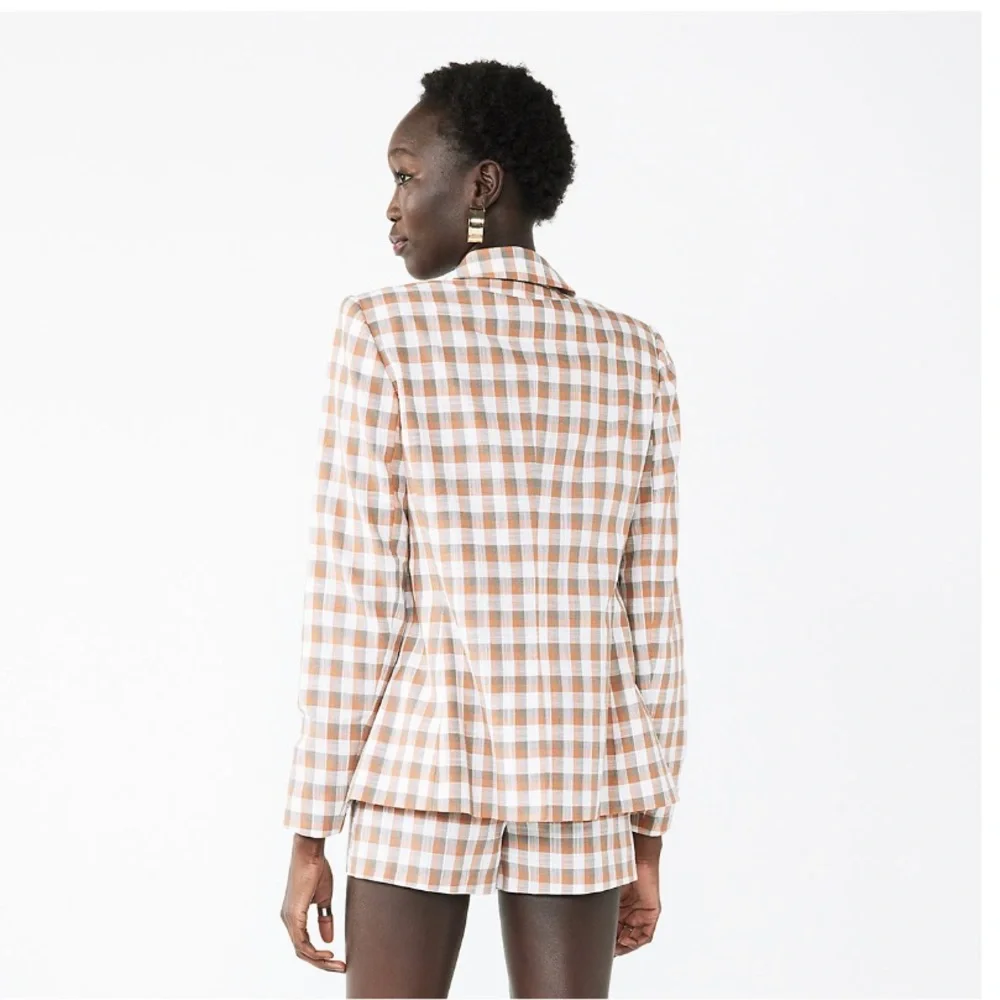 Layer in a chic look with this women's Nine West Double-Breasted Blazer. - Picture 3 of 4